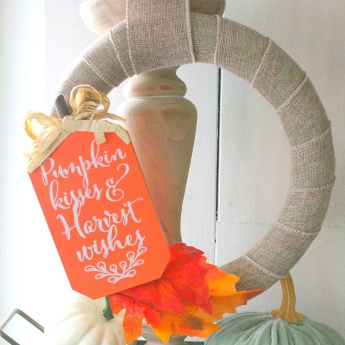 wreath hanging from a candlestick pillar