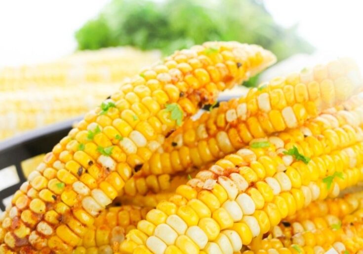 basket with corn ribs stacked inside on counter