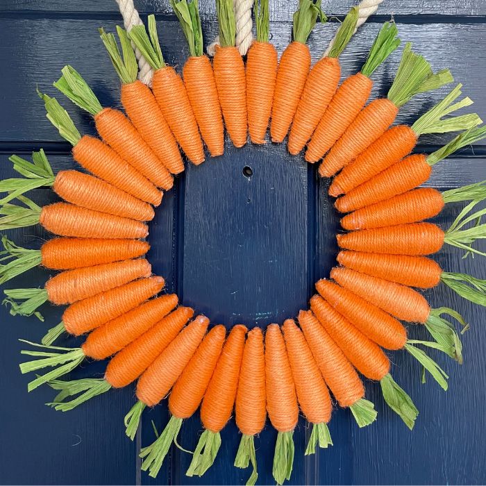 carrot wreath on a blue front door
